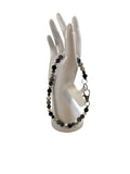 Attache cellulaire howlite et hématite